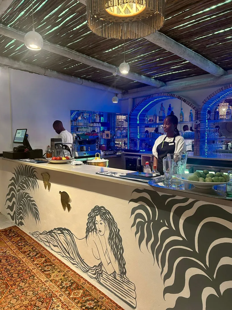 The bar with its hand-painted mural