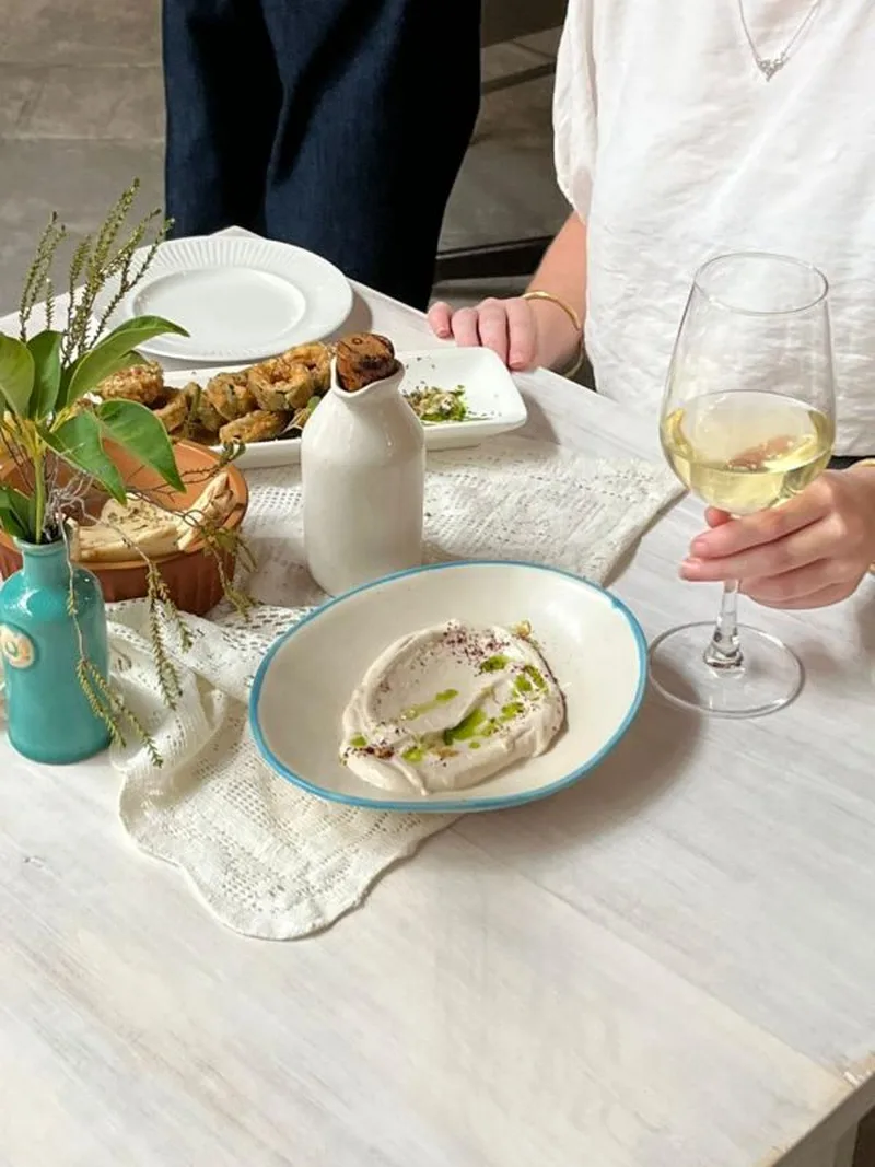 A dip and a glass of white wine