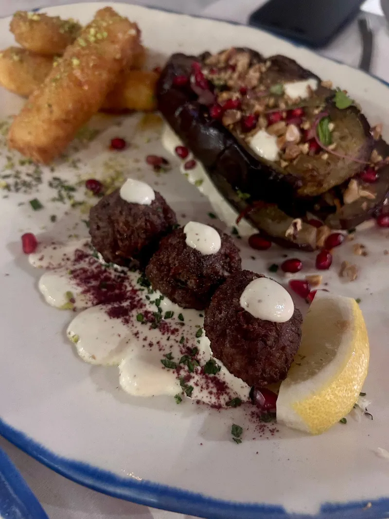Keftedes, halloumi and roast aubergine on a Nostos plate