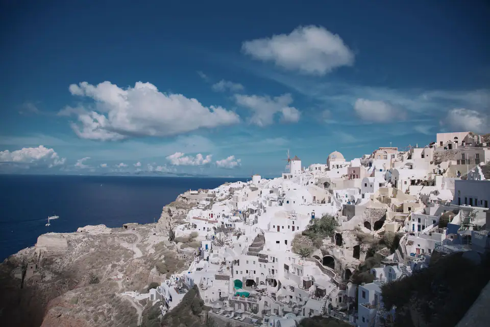 Whitewashed Oia village on the caldera cliffs of Santorini